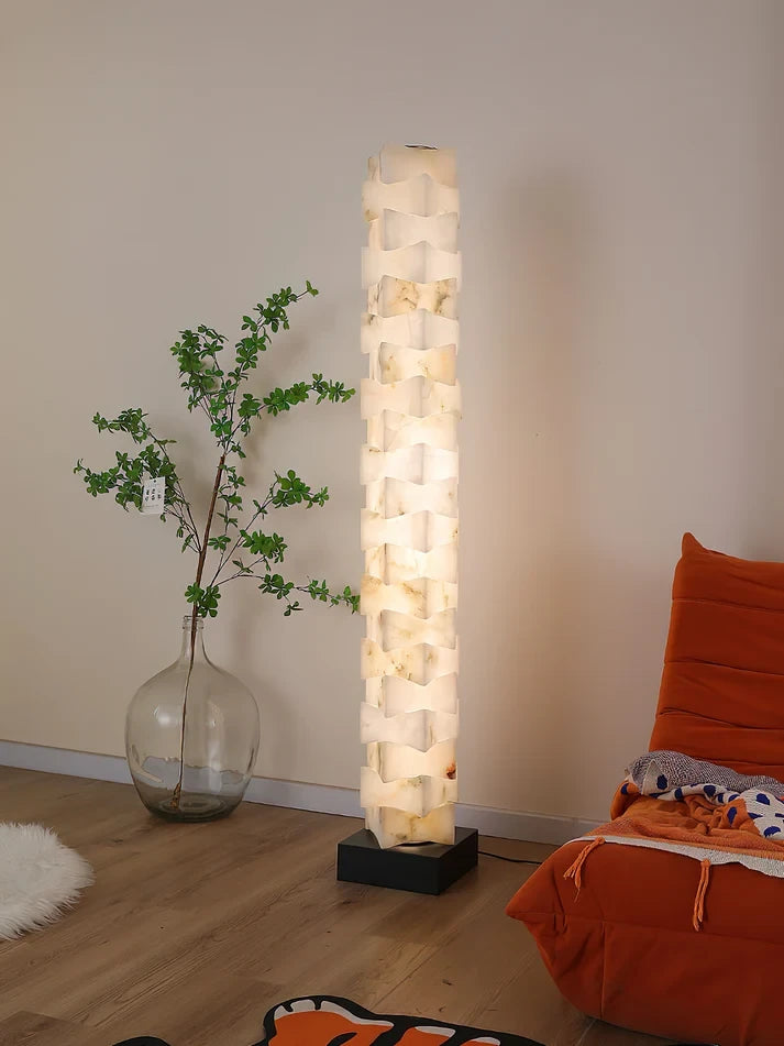 Geometric Alabaster Column Floor Lamp Over Living Room Armchair