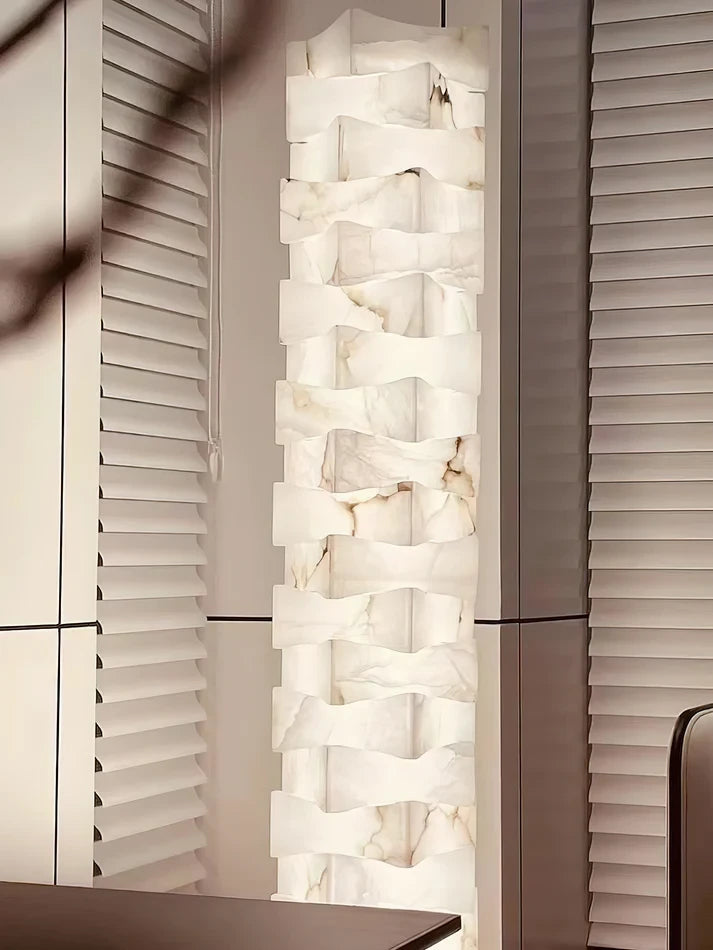 Stacked Alabaster Column Floor Lamp Beside Blinds Window