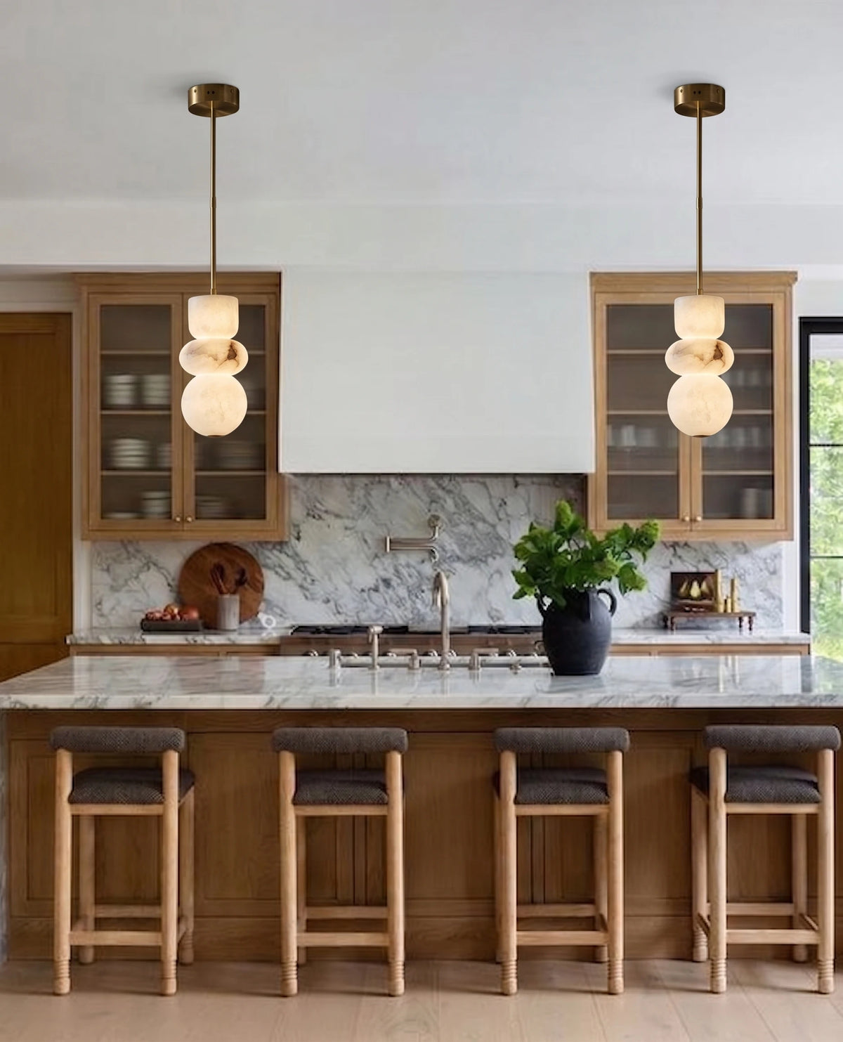 Pair of Modern Alabaster Mini Pendant Lamps Over Kitchen Island