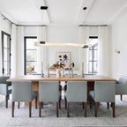 Modern Linear Alabaster Pendant Light Over Wooden Dining Table