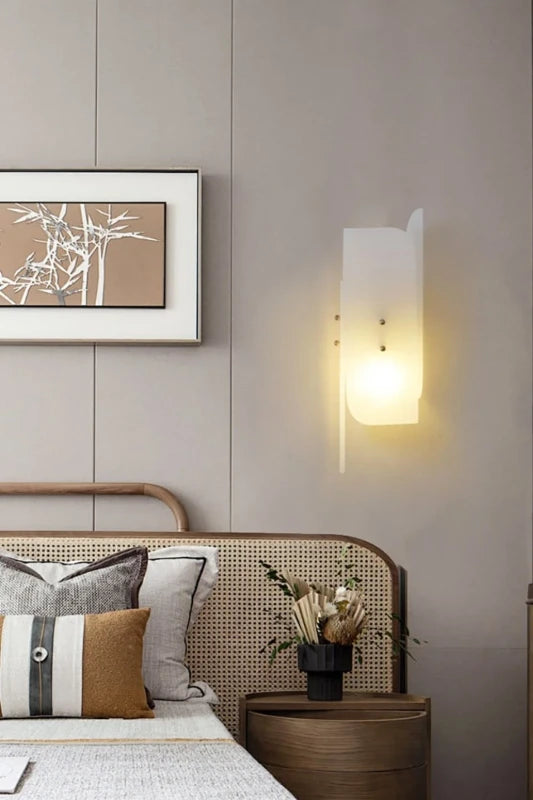 Modern Interlocking Wall Sconce in Bedroom Setting