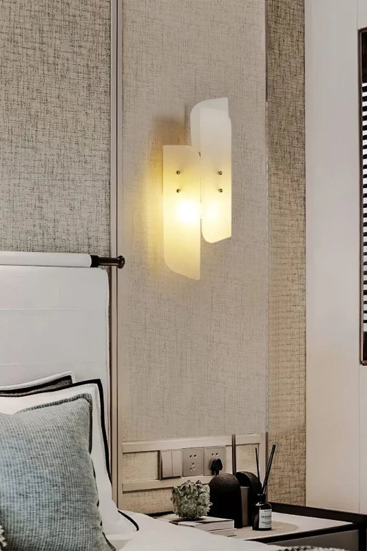Side View of Illuminated Modern Interlocking Art Glass Wall Sconce