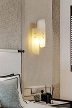Side View of Illuminated Modern Interlocking Art Glass Wall Sconce