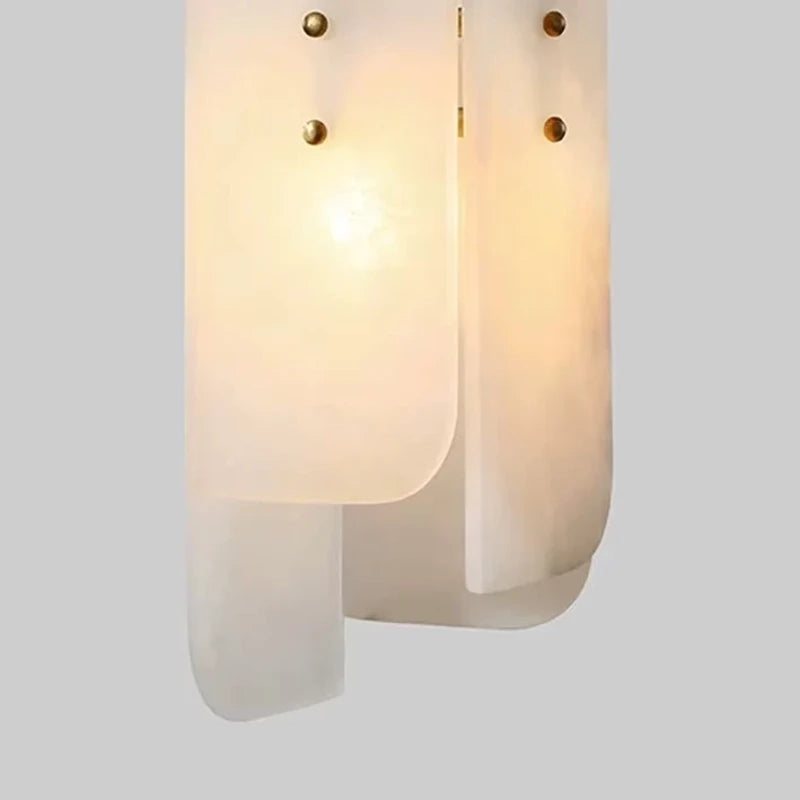 Close Up View of Interlocking Art Glass Shades and Internal Bulbs
