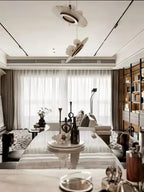 Modern Alabaster Disc Chandelier Over Dining Room Table
