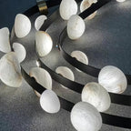 Illuminated Modern Black Frame Alabaster Art Glass Chandelier Studio Shot