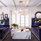 Modern Brass Layered Wave Disc Chandelier in Elegant Living Area