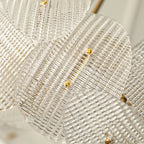 Close Up View of Layered Wave Disc Glass Texture and Gold Connector Details