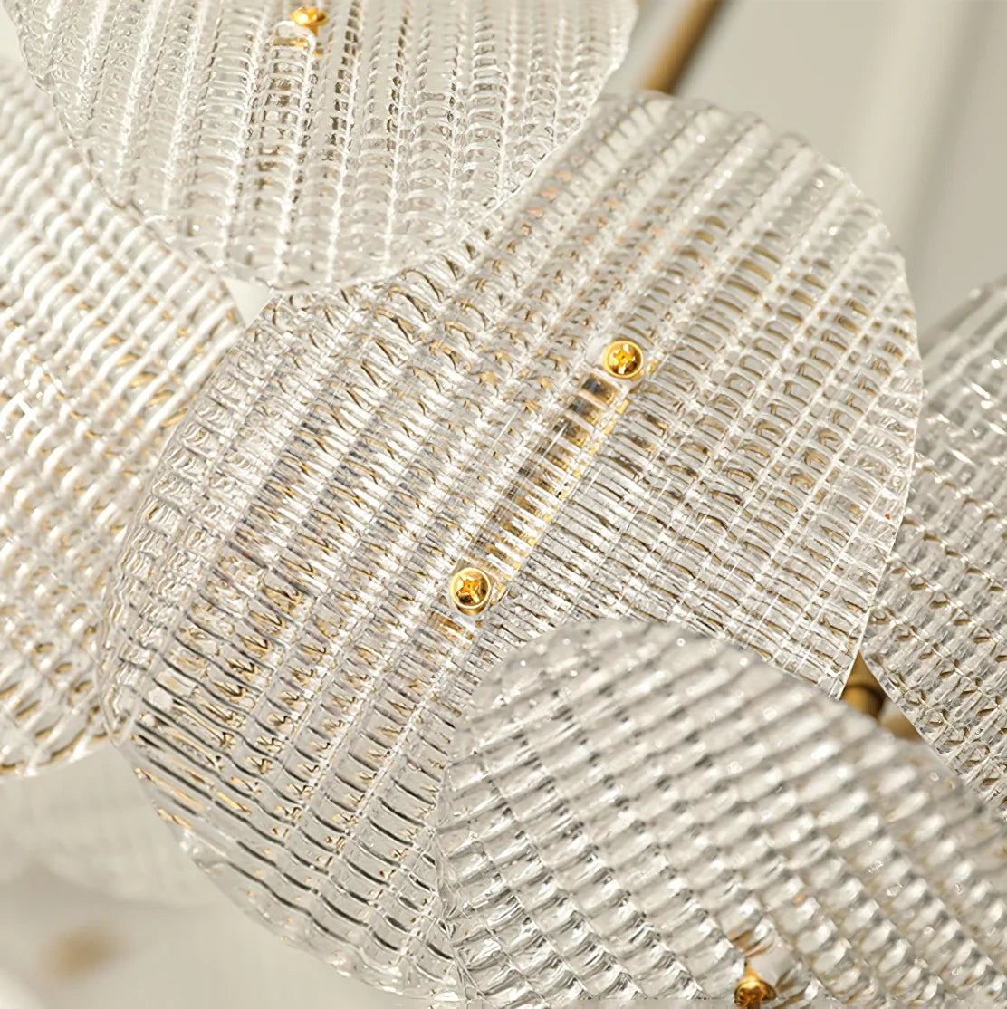 Close Up View of Layered Wave Disc Glass Texture and Gold Connector Details
