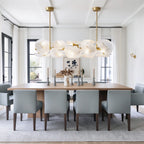 Modern Brass Layered Wave Disc Chandelier in Stylish Dining Room
