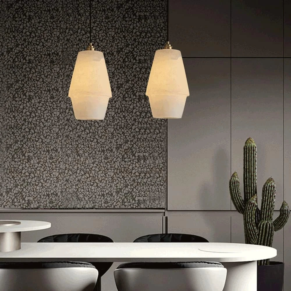 Modern Faceted Alabaster Pendant Lights Over Dining Room Table