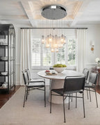 Modern Art Glass Chandelier Over Contemporary Dining Table
