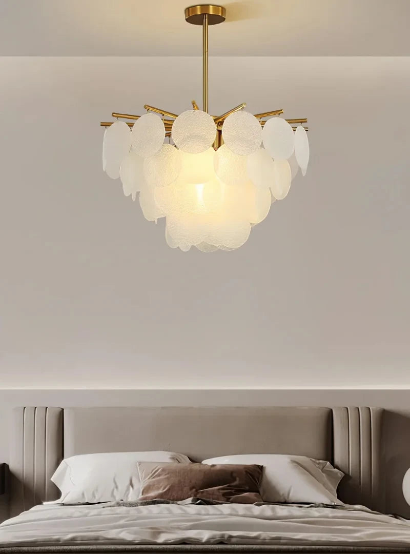Modern Brass White Disc Chandelier in Master Bedroom Setting