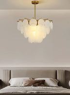 Modern Brass White Disc Chandelier in Master Bedroom Setting