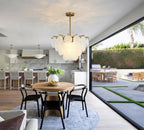 Modern Brass White Disc Chandelier Over Kitchen Dining Area