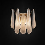 Illuminated Modern Brass and Ice Glass Wall Sconce Studio Shot