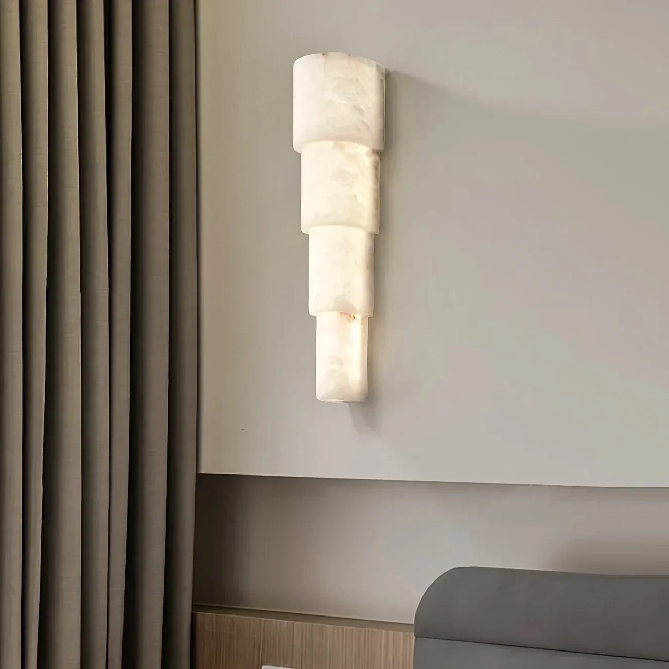 Tiered Alabaster Wall Light Illuminating Living Room Corner