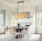Modern Crystal Rod Linear Chandelier in Bright Dining Area