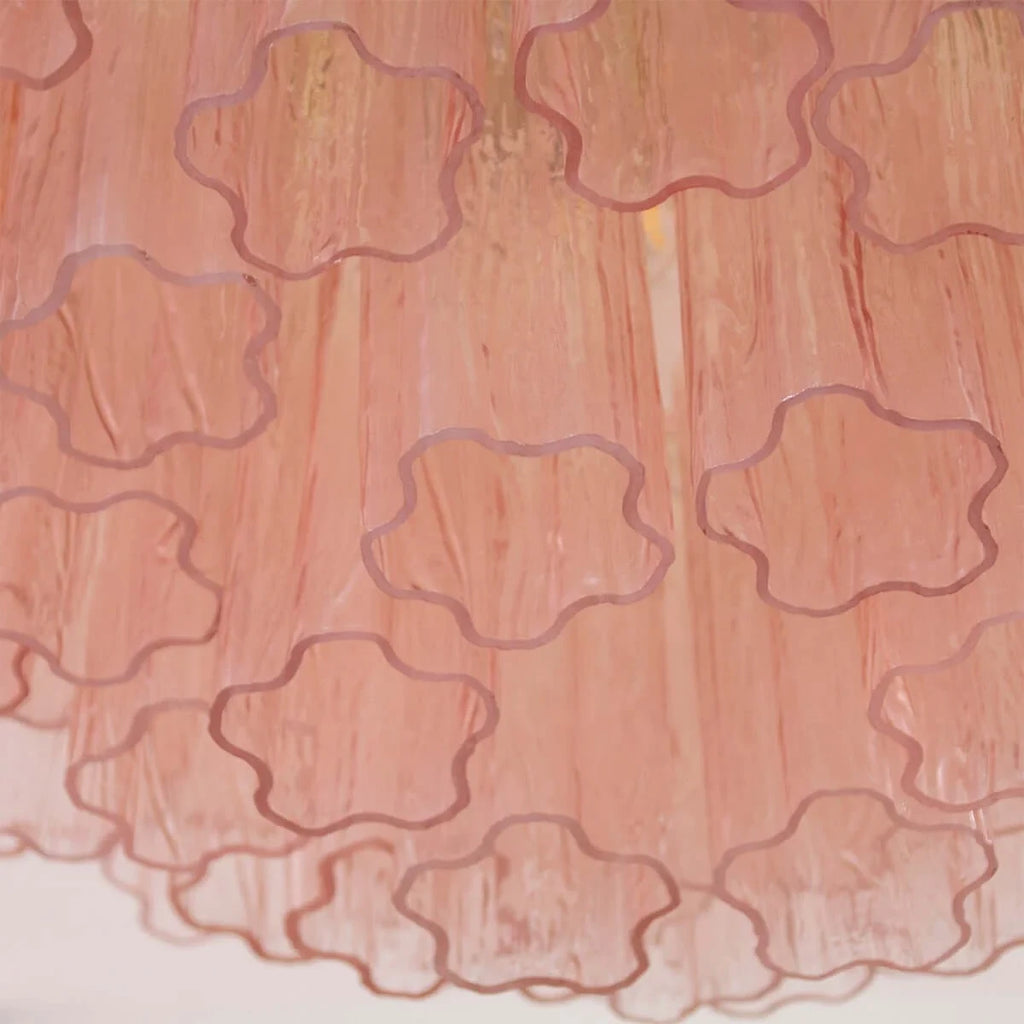 Close Up View of Illuminated Pink Crystal Prism Ceiling Light Texture