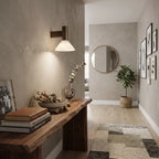 Modern Brass and Marble Wall Sconce Along Hallway Corridor