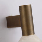 Close Up View of Brass Cylinder Fixture and Marble Shade Connection