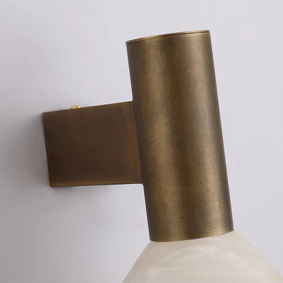 Close Up View of Brass Cylinder Fixture and Marble Shade Connection