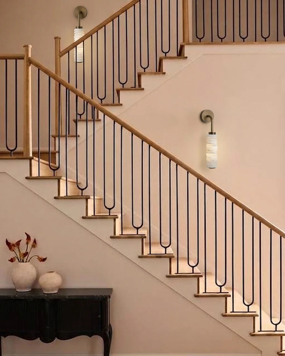 Modern Natural Material Wall Sconce Along Architectural Staircase