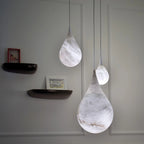 Modern Natural Marble Teardrop Pendant Lights in Minimalist Bedroom Setting