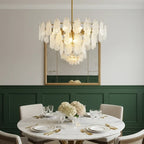 Modern Brass Crystal Irregular Disc Chandelier in Elegant Dining Area
