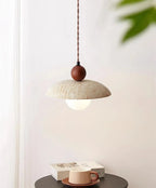 Minimalist Travertine Pendant Light Over Coffee Table Nook