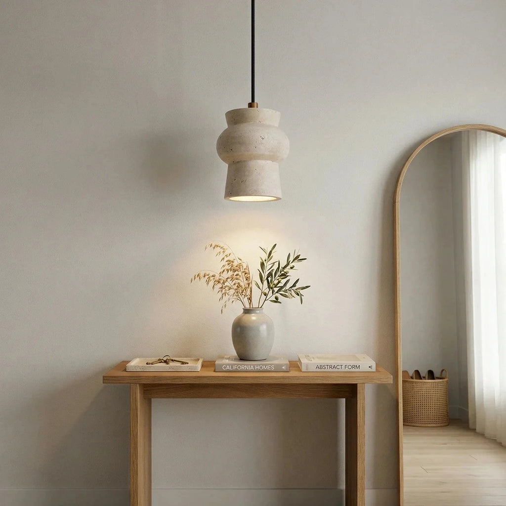 Sculptural Travertine Pendant Light Over Entryway Console Table