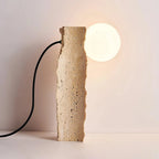 Side View of Illuminated Travertine Stone Table Lamp