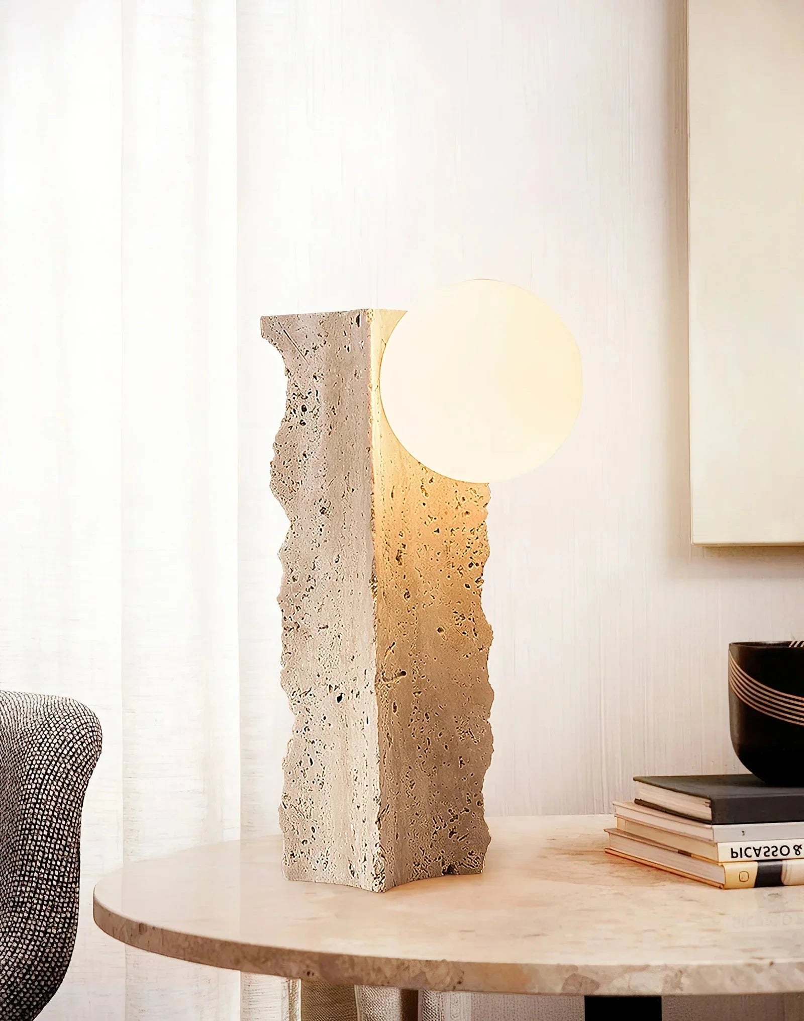 Wabi Sabi Travertine Table Lamp Over Wooden Side Table
