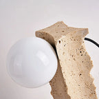 Top Down View of Chiseled Stone Pillar and Glass Globe