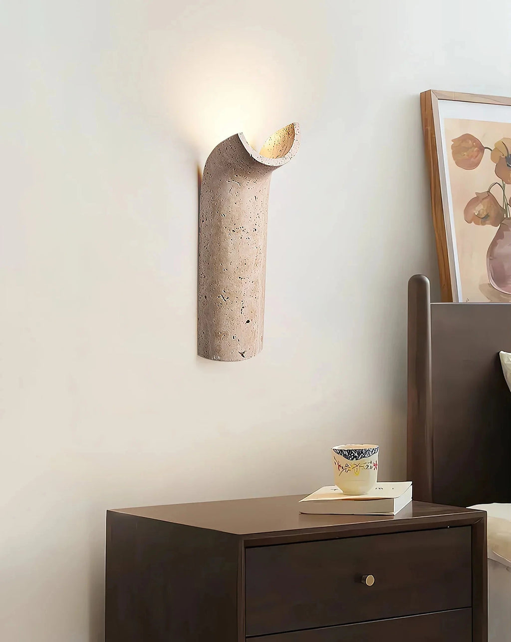 Japandi Travertine Wall Sconce Over Bedroom Nightstand