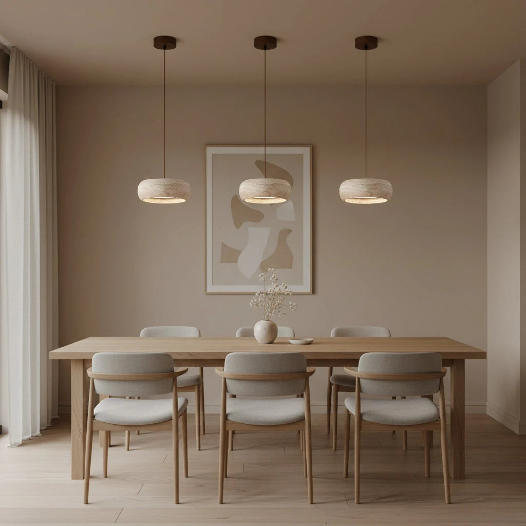 Trio of Travertine Pendant Lights Over Dining Room Table