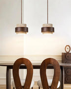Modern Wood Band Mini Pendant Lights Over Dining Table