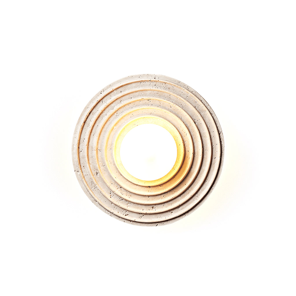 Modern Concentric Ring Travertine Wall Sconce with Globe Bulb on White Background