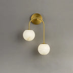 Illuminated Modern Asymmetrical Globe Art Glass Wall Sconce Studio Shot