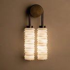Illuminated Modern Double-Tube Capiz Shell Wall Sconce on Dark Background