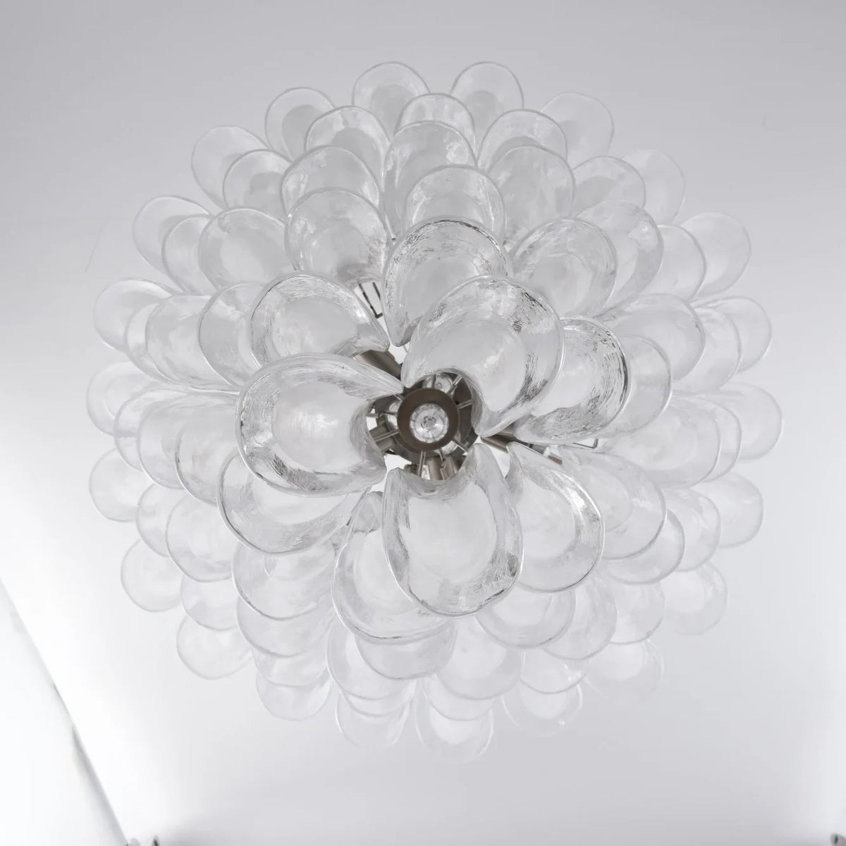 Top Down View of Cascading White Tulip Art Glass Arrangement