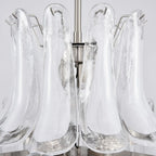 Close Up View of White Tulip Art Glass Shades and Chandelier Structure