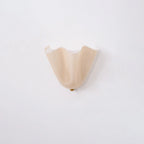 Illuminated Modern Beige Art Glass Wall Sconce Studio Shot