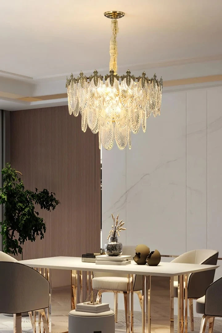 Modern Antique Brass Clear Feather Chandelier in Elegant Dining Setting