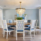 Modern Antique Brass Clear Feather Chandelier in Formal Dining Area