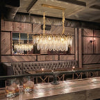 Modern Antique Brass Amber Feather Chandelier in Retro Lounge Bar Setting