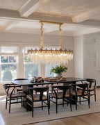 Modern Antique Brass Amber Feather Chandelier in Luxury Dining Area