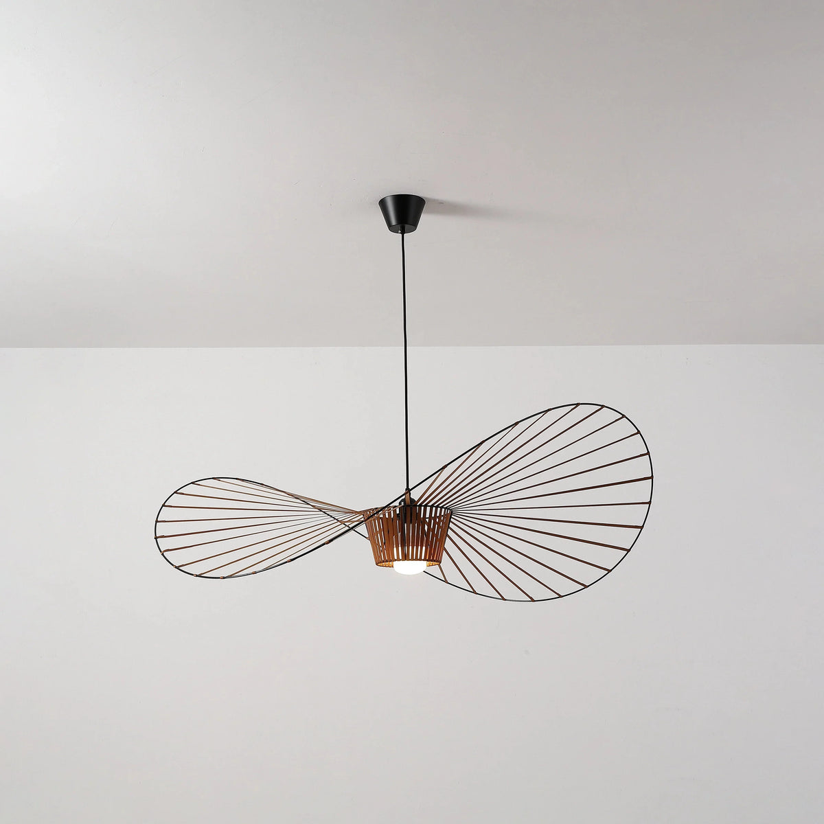 Front View of Modern Wood Base Black Wire Pendant Light Studio Display