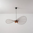 Illuminated Modern Wood Base Black Wire Pendant Light Studio Shot