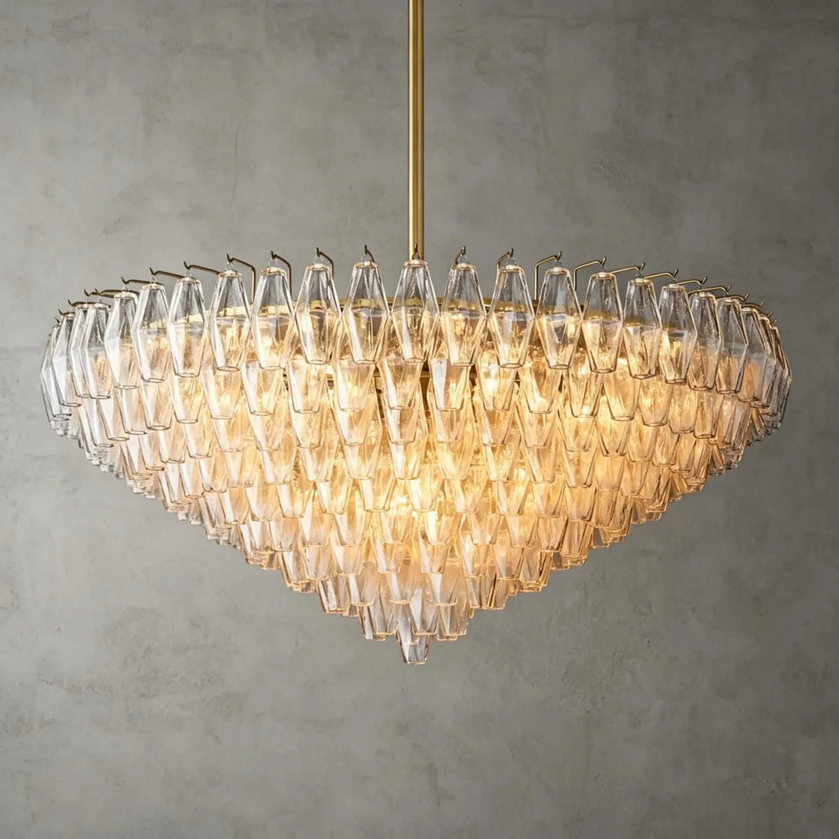 Bottom Up View of Illuminated Modern Cascading Amber Faceted Glass Chandelier